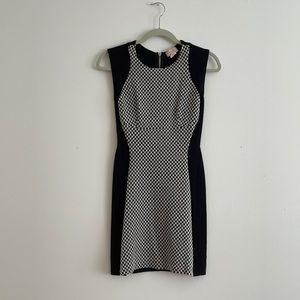 Sleeveless black dress w/ front checkered pattern